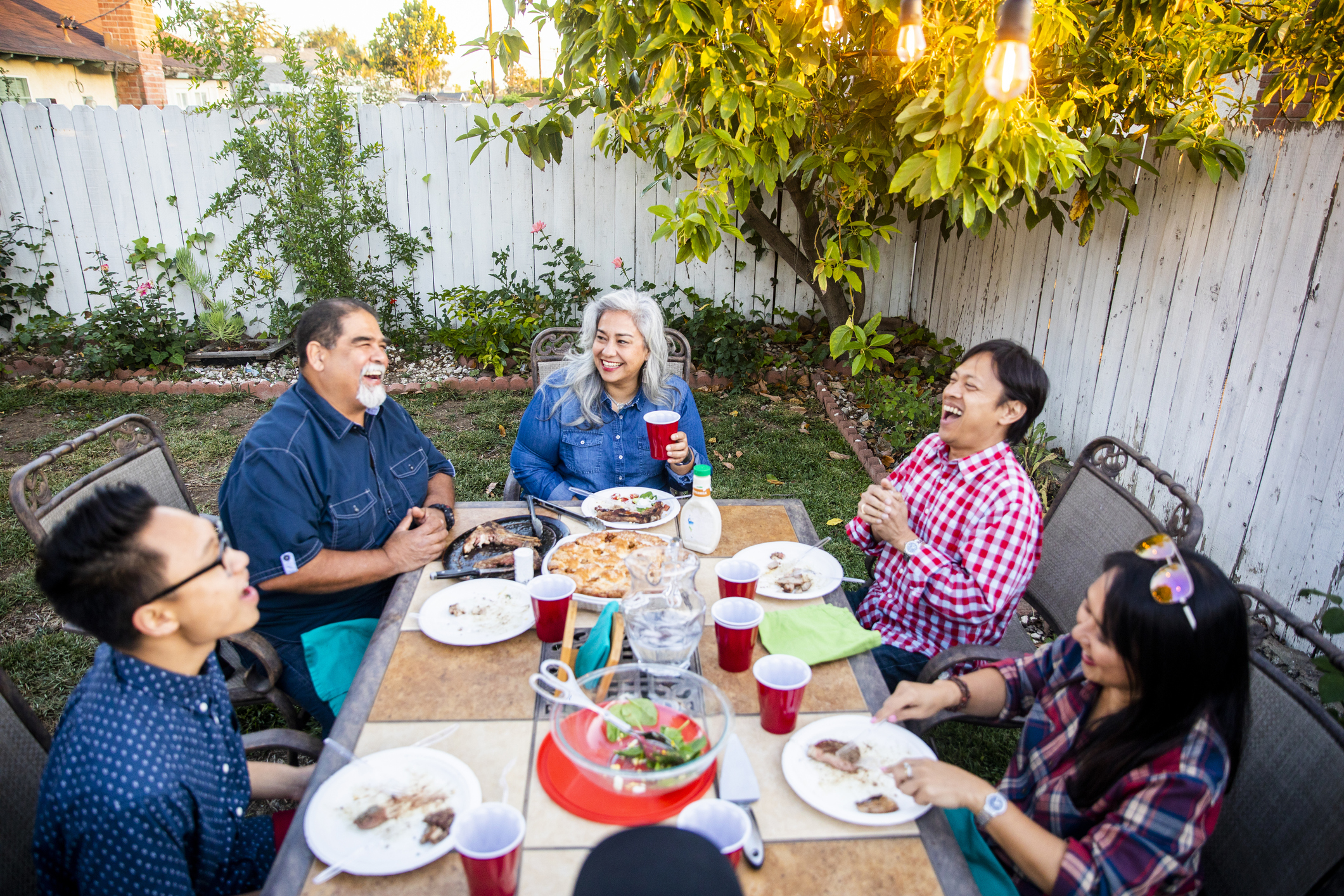 Outdoor Dinner on Beautiful Summer Evening Outdoor Dinner on Beautiful Summer Evening