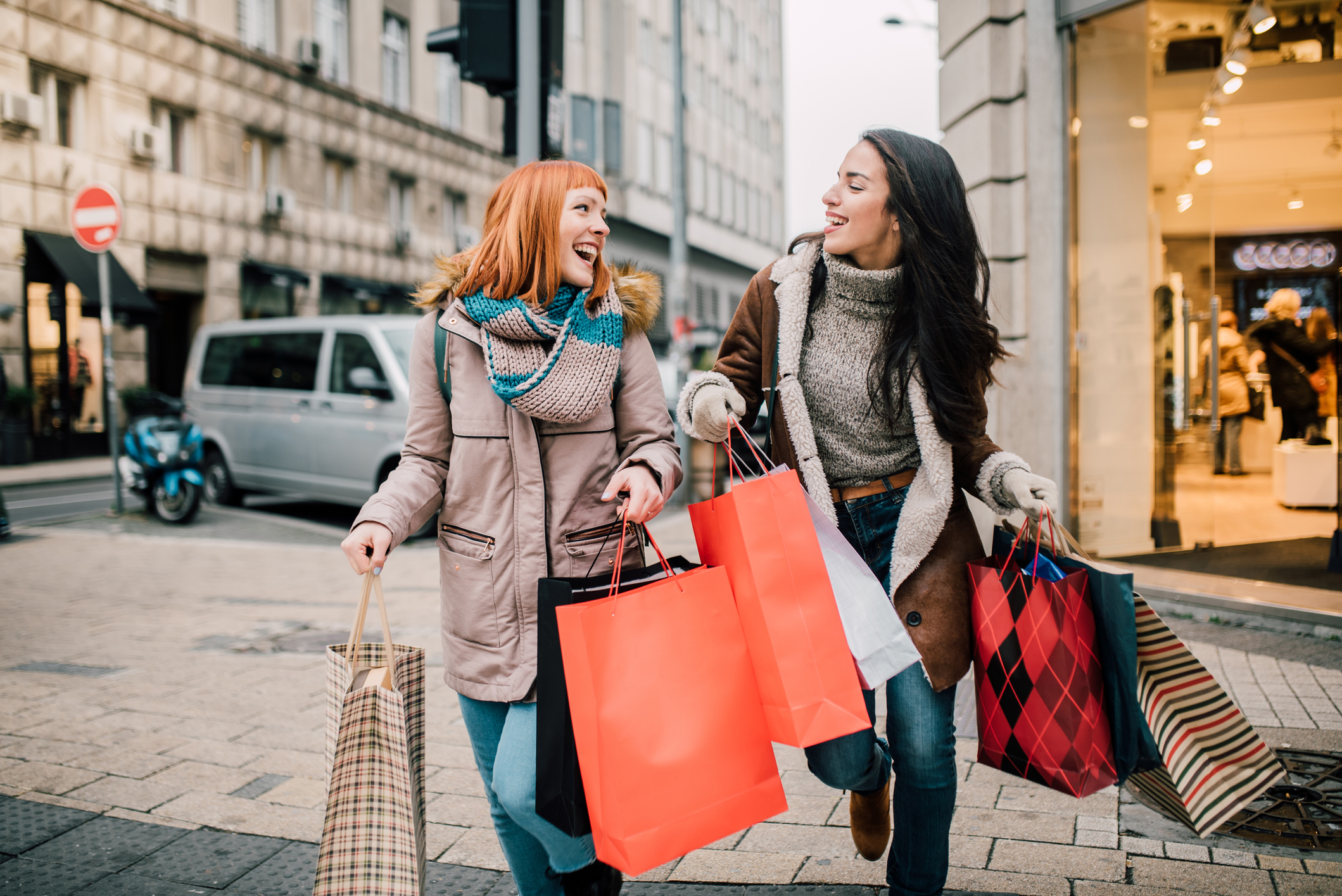 Girls carrying shopping bags